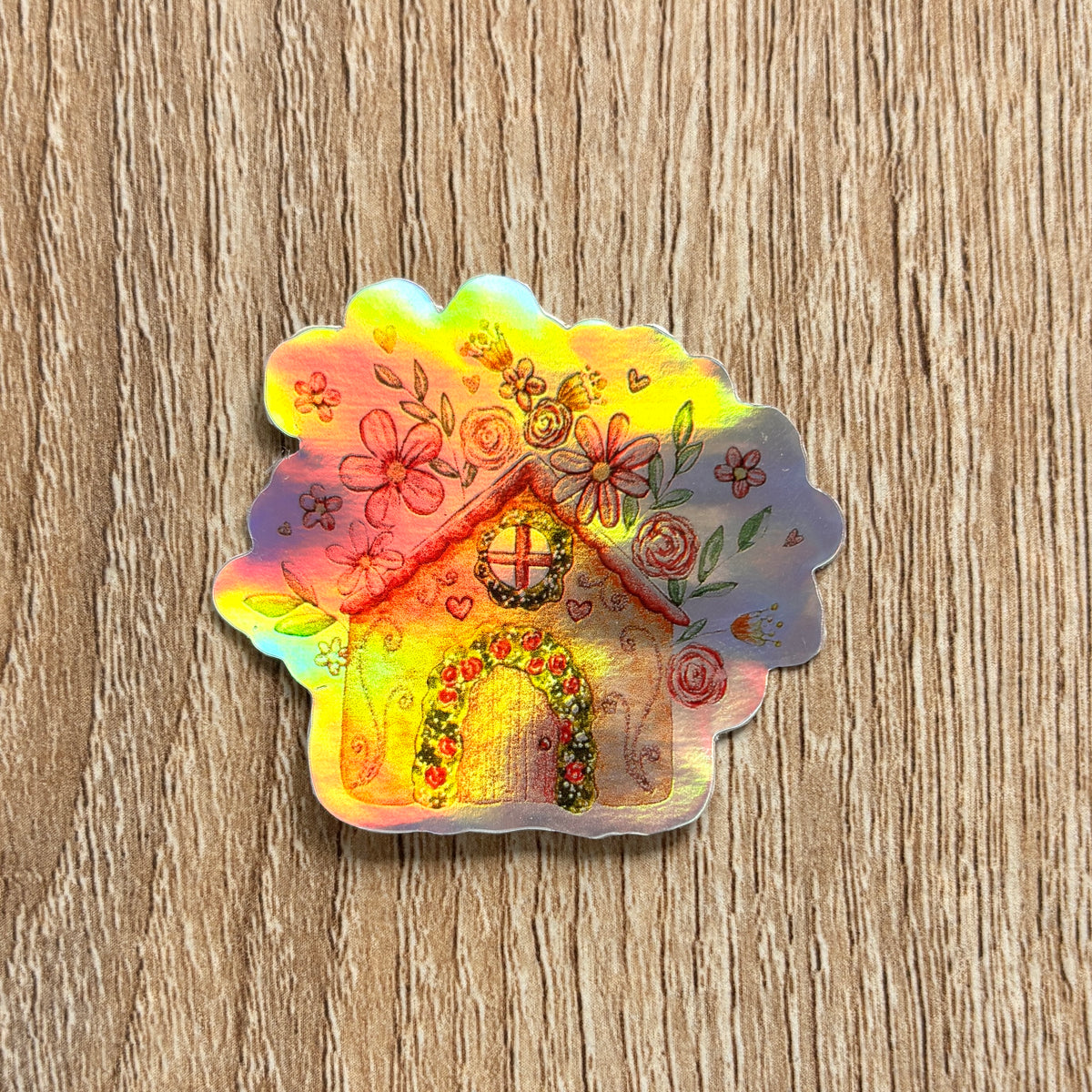 sticker représentant une maison holographique fleurie