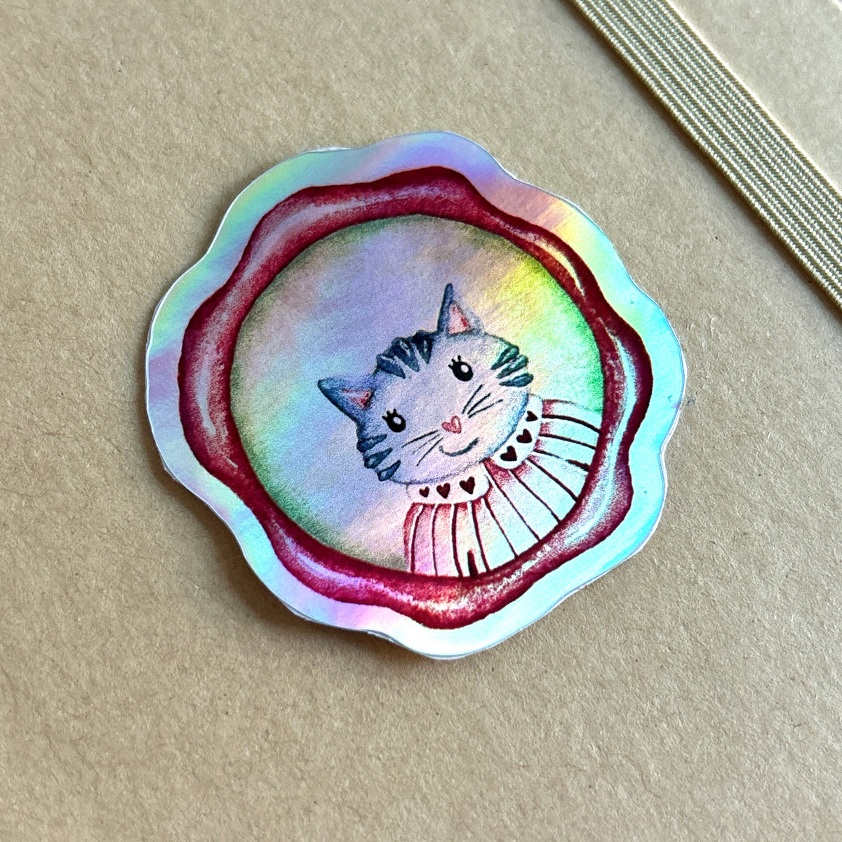 sticker représentant un cadre portrait de chat holographique
